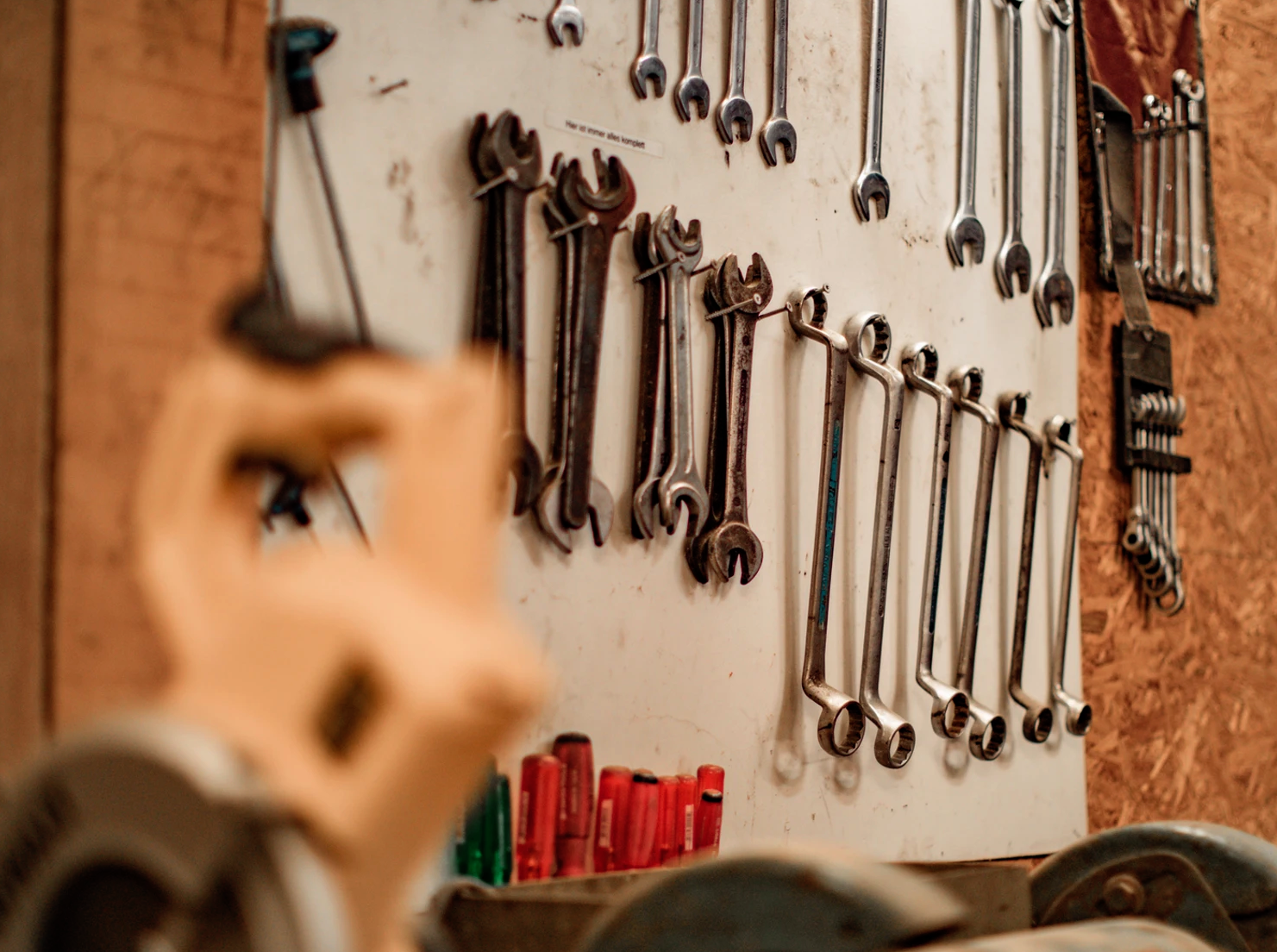 Wrenches and spanners in a workshop.