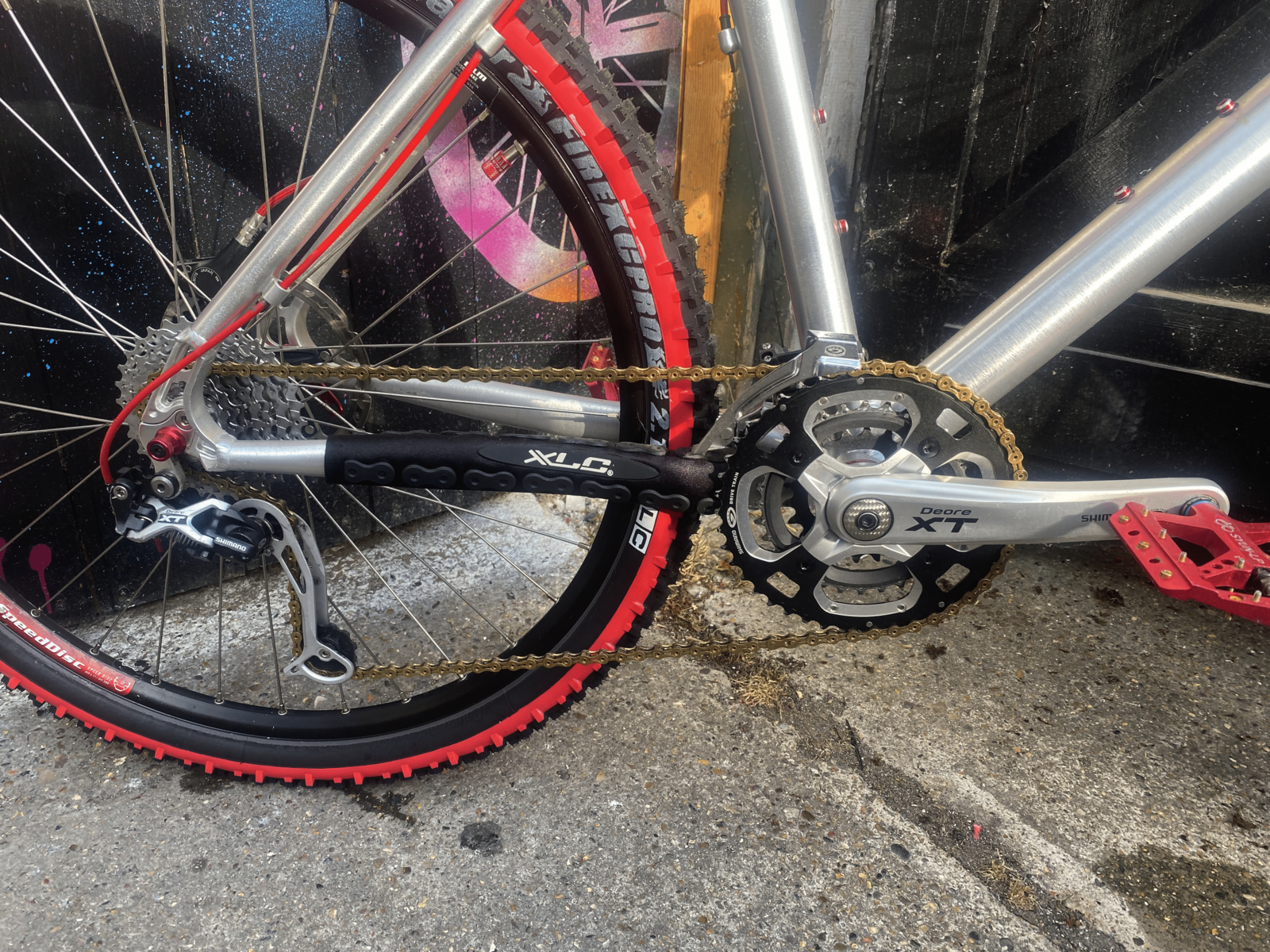 A customised bike with a golden chain.