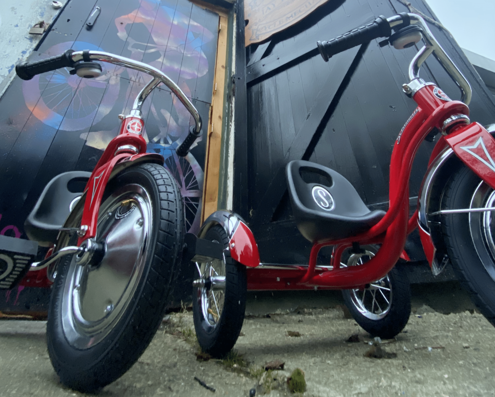Retro tricycles in red.