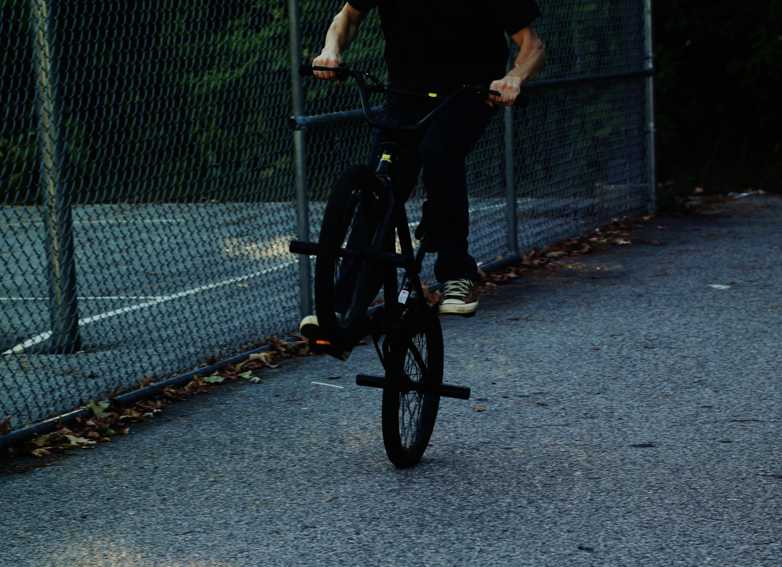 A BMX cyclist performing a trick.